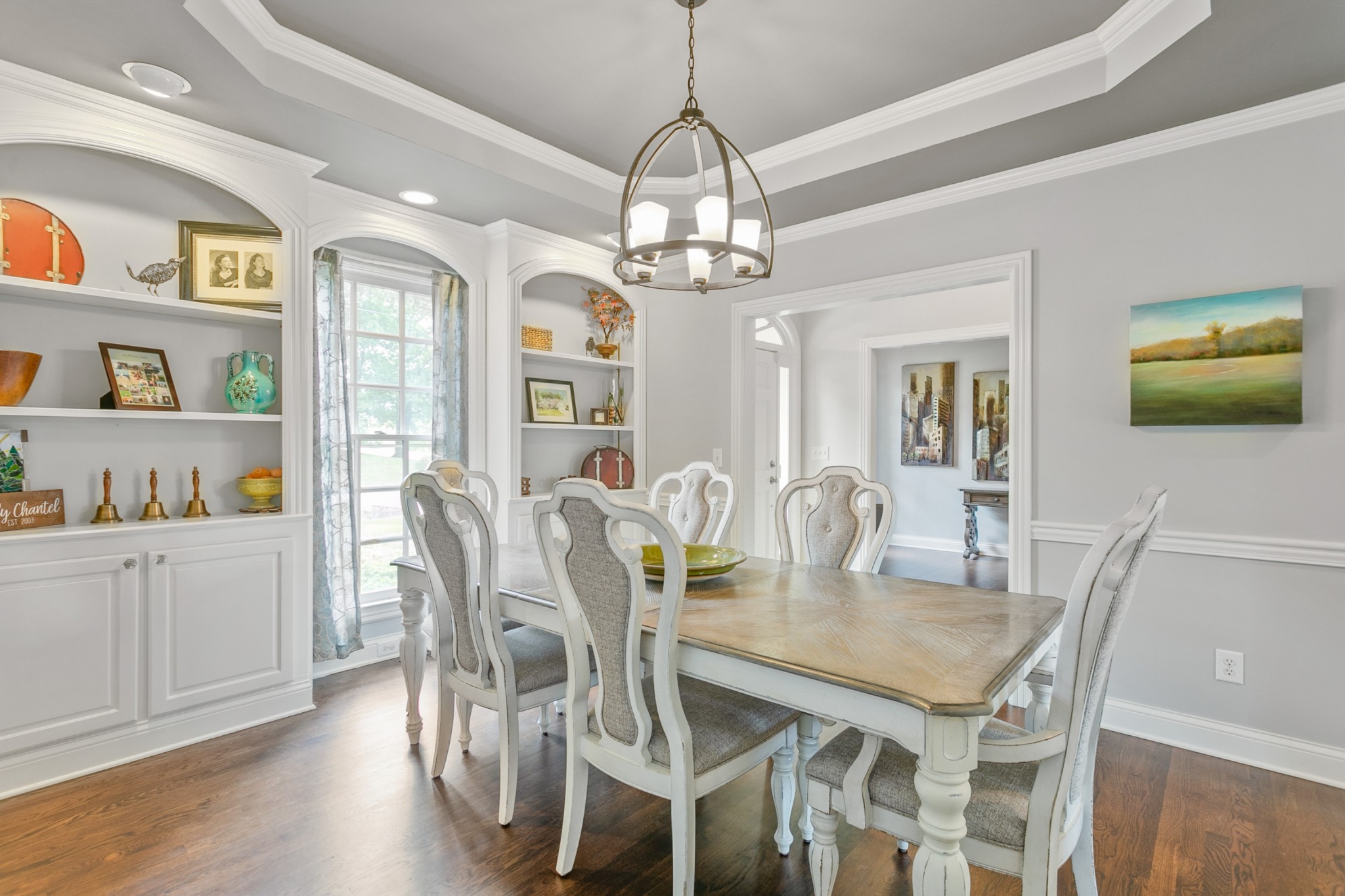 308 Monticello Road Franklin, TN 37064 - Photo 5 of 24 a view of a dining room with furniture a chandelier and wooden floor