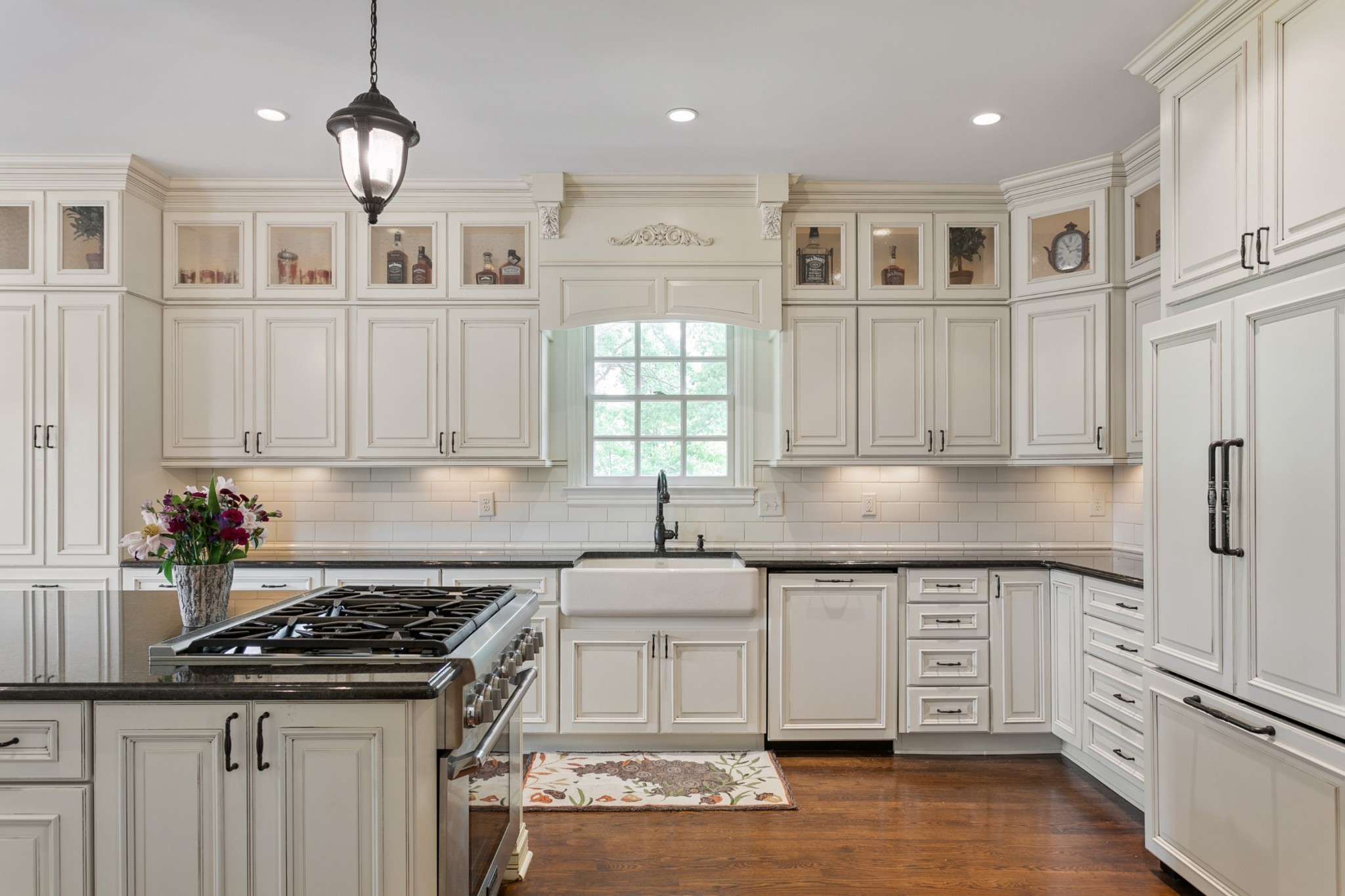 308 Monticello Road Franklin, TN 37064 - Photo 6 of 24 a kitchen with granite countertop a stove a sink dishwasher and a refrigerator