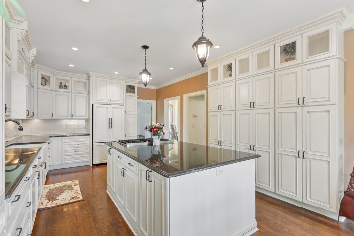308 Monticello Road Franklin, TN 37064 - Photo 7 of 24 a kitchen with sink refrigerator and cabinets