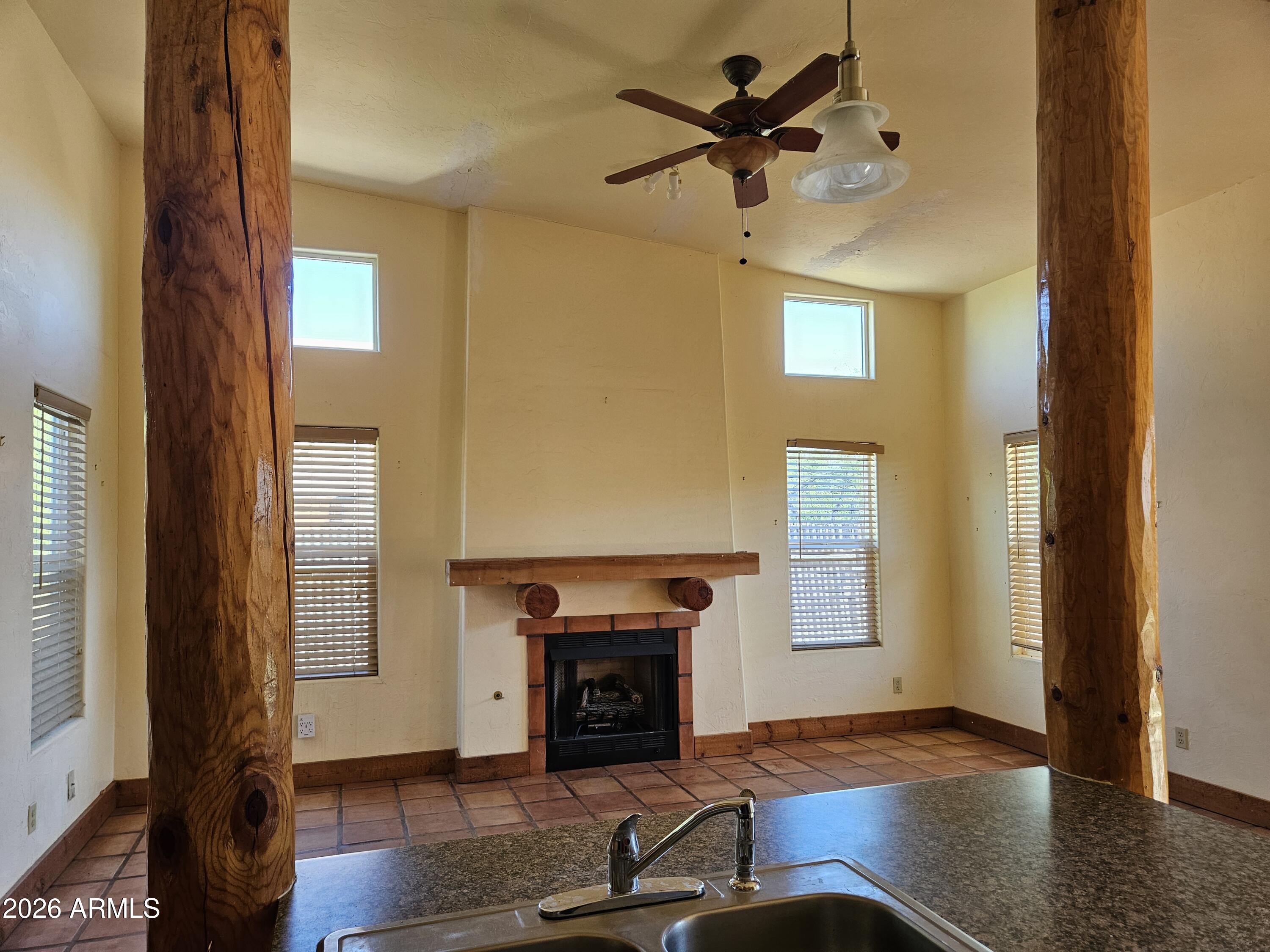 4105 North Washington Avenue Douglas, AZ 85607 - Photo 5 of 61 a living room with furniture and a fireplace