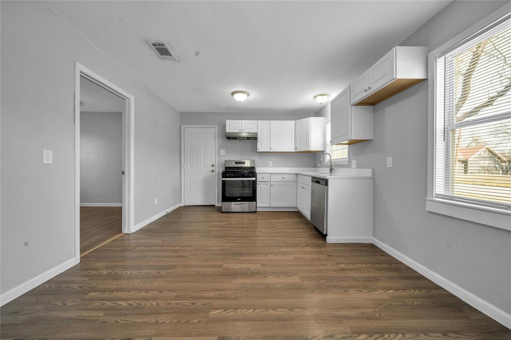 901 Johnson Street Terrell, TX 75160 - Photo 11 of 21 a view of kitchen with wooden floor