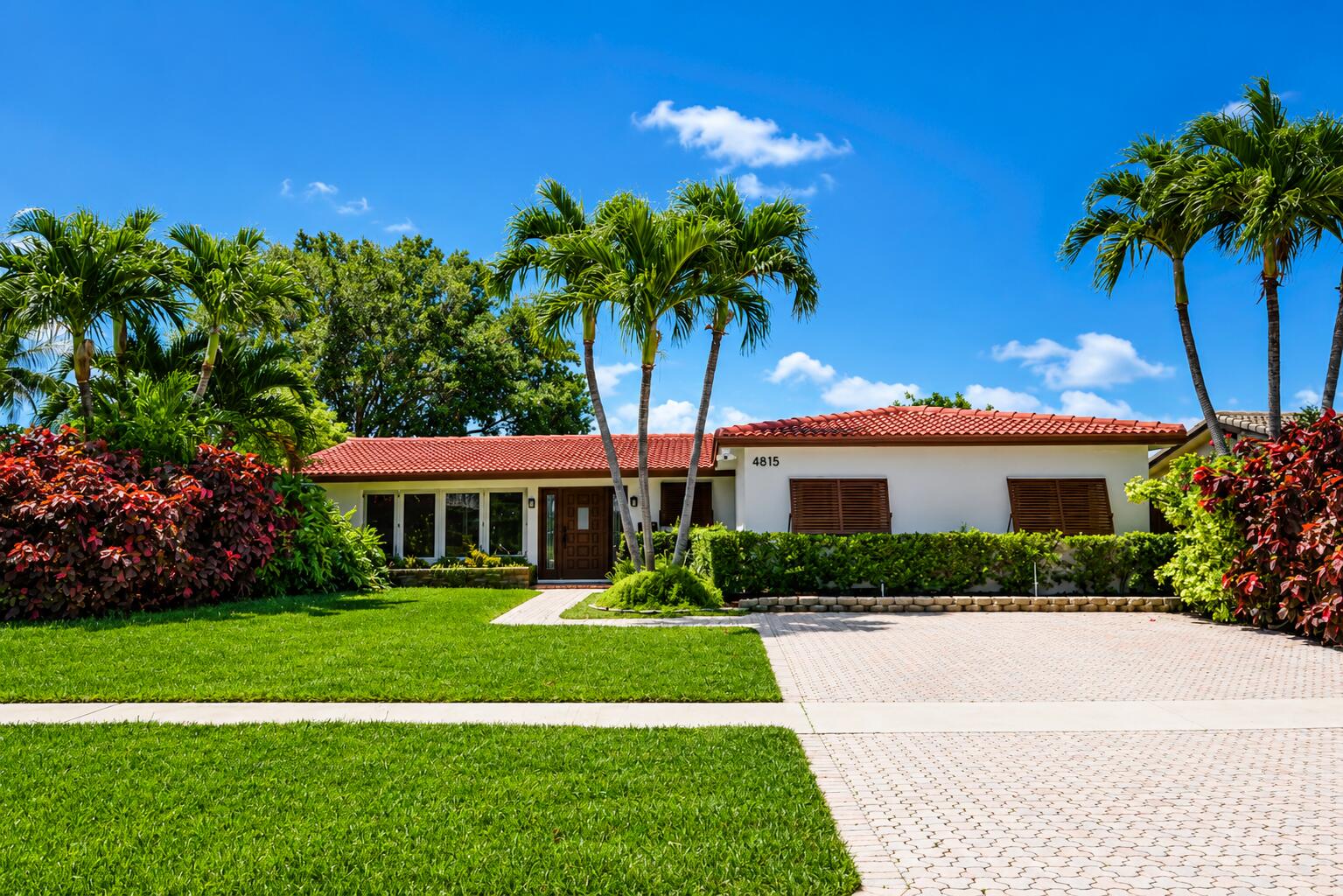 4815 Cleveland Street Hollywood, FL 33021 - Photo 31 of 31 a front view of a house with a yard