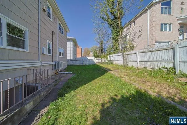 a view of a backyard with a garden