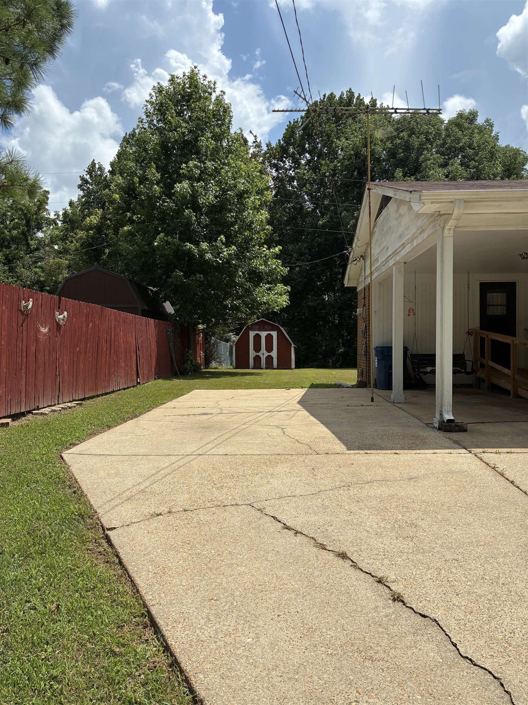 1421 Central Curve Road Ripley, TN 38063 - Photo 3 of 17 View of home's exterior with a storage unit