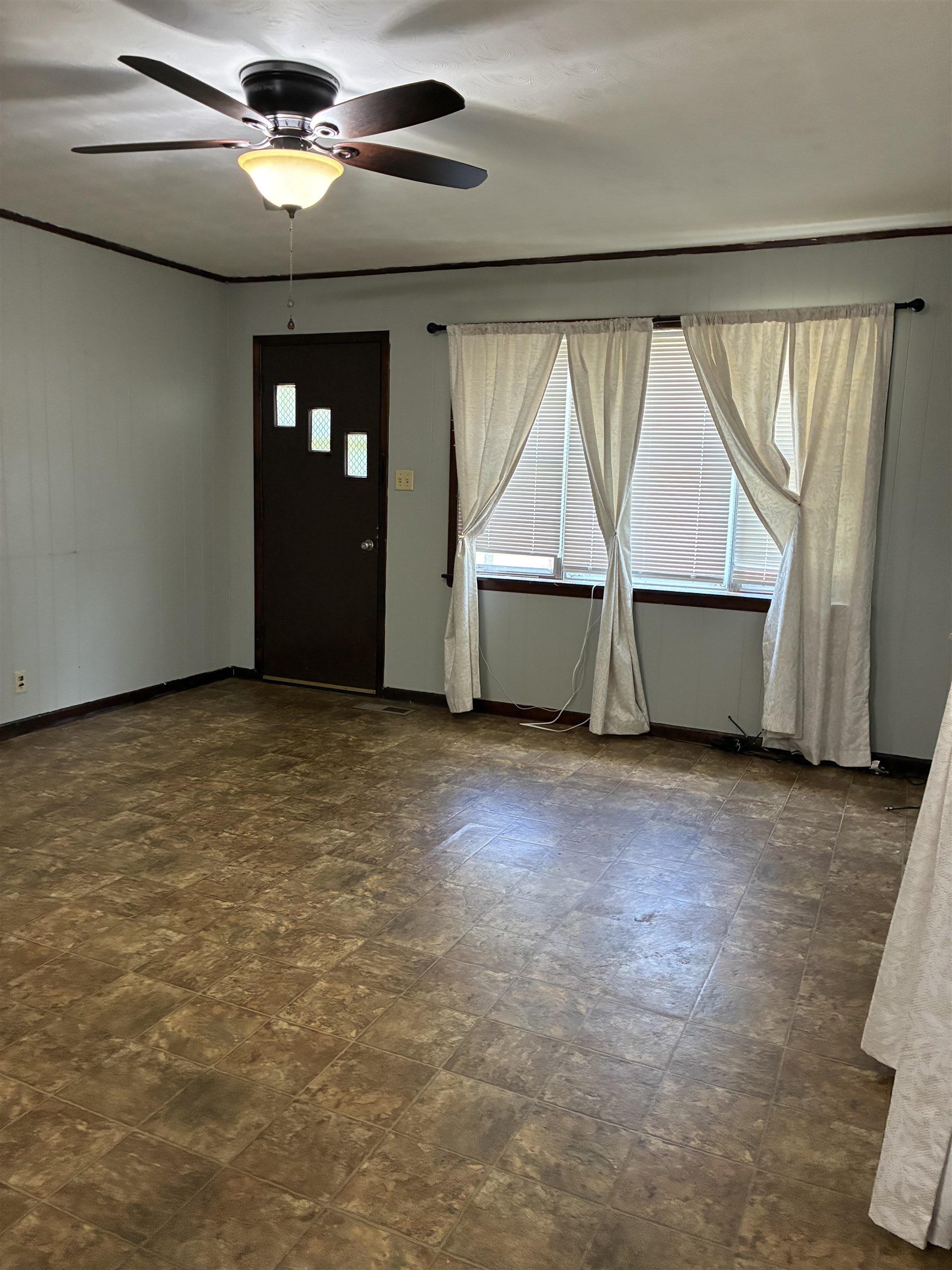1421 Central Curve Road Ripley, TN 38063 - Photo 6 of 17 Entryway featuring baseboards and a ceiling fan
