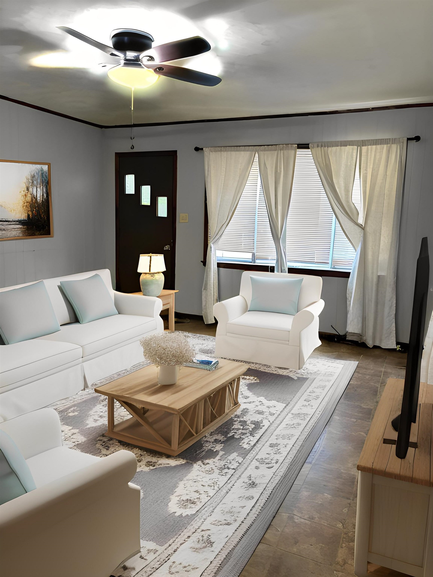 1421 Central Curve Road Ripley, TN 38063 - Photo 7 of 17 Living area with ceiling fan and wood finished floors