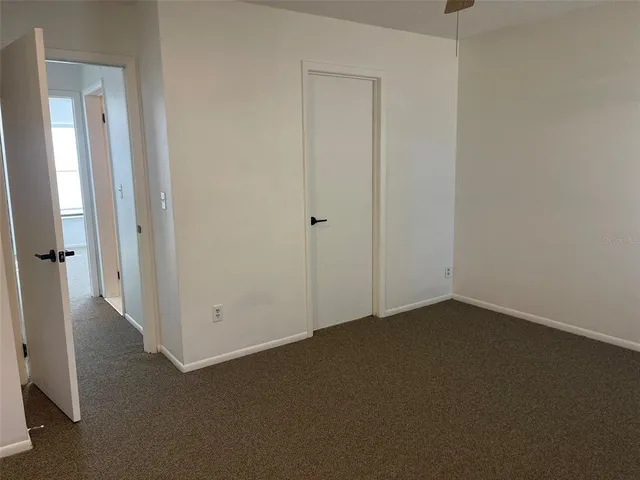 an empty room with a hallway