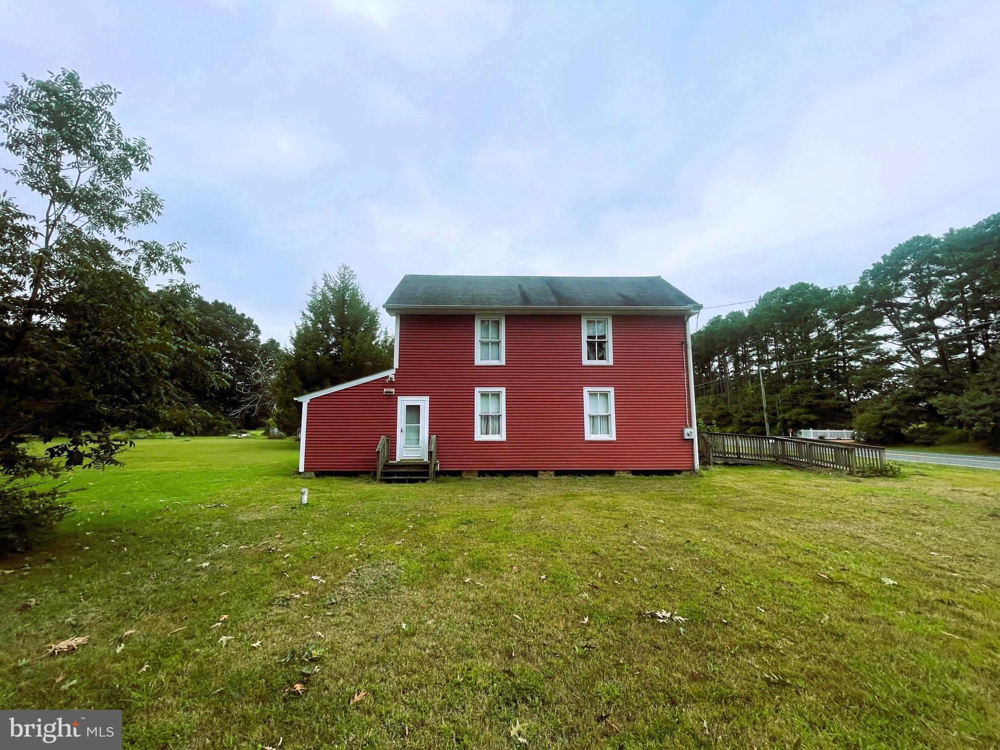 7983 Bozman Neavitt Road Bozman, MD 21612 - Photo 4 of 5 a view of a house with a yard
