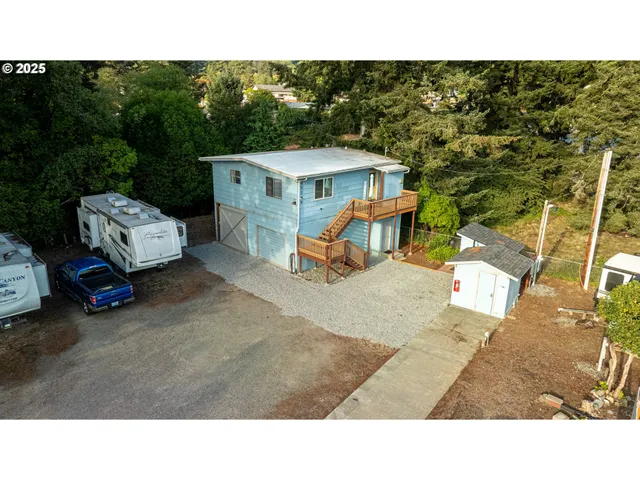 a upper view of a house with a yard