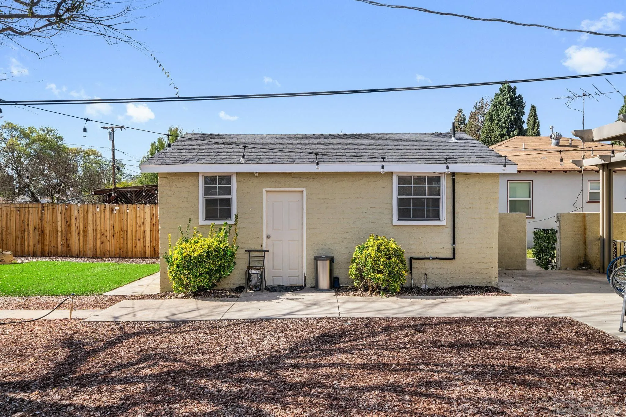 4544 Edgewood Place Riverside, CA 92506 - Photo 17 of 29 a front view of a house with garden