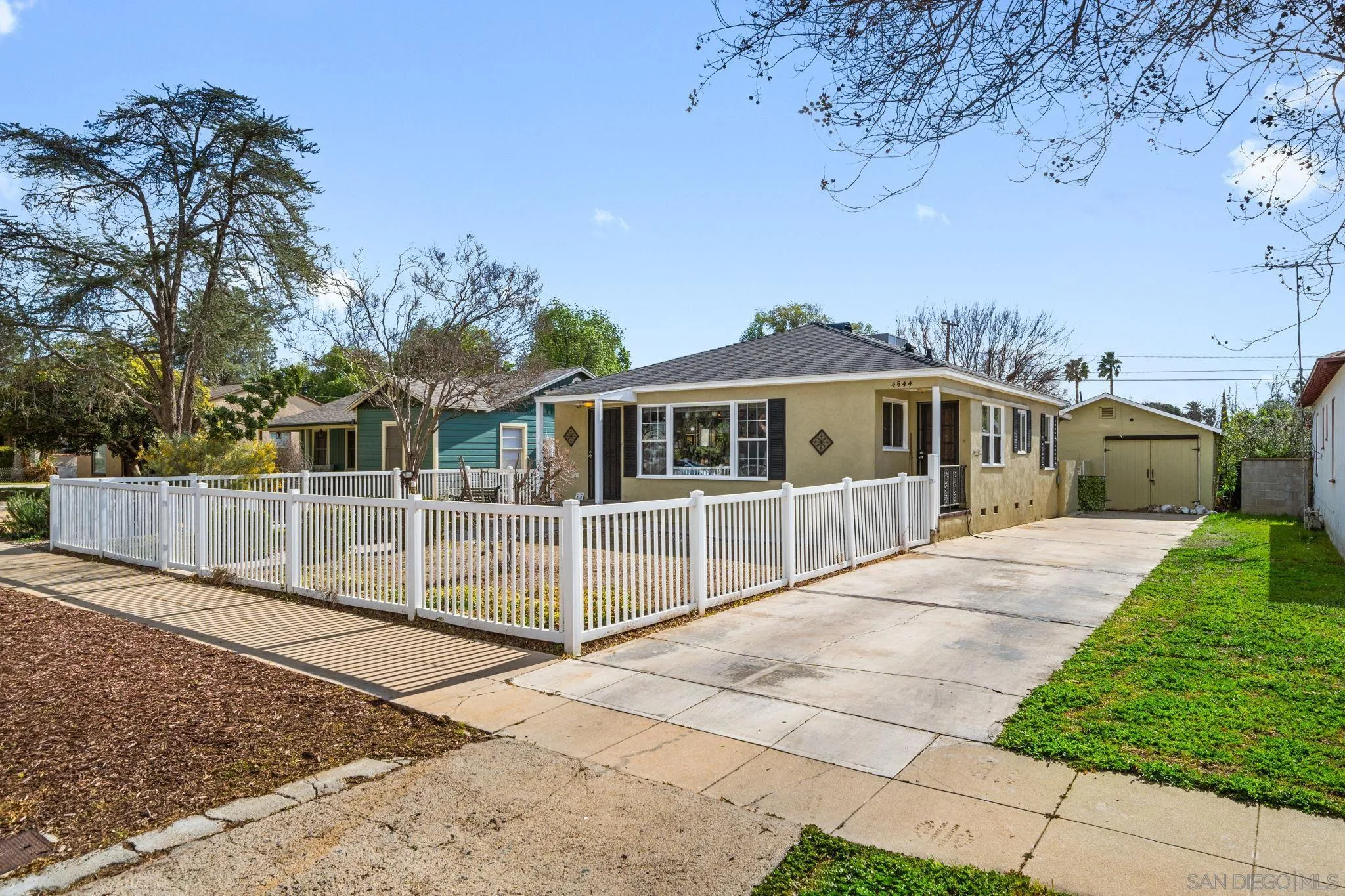 4544 Edgewood Place Riverside, CA 92506 - Photo 2 of 29 a front view of a house with a garden
