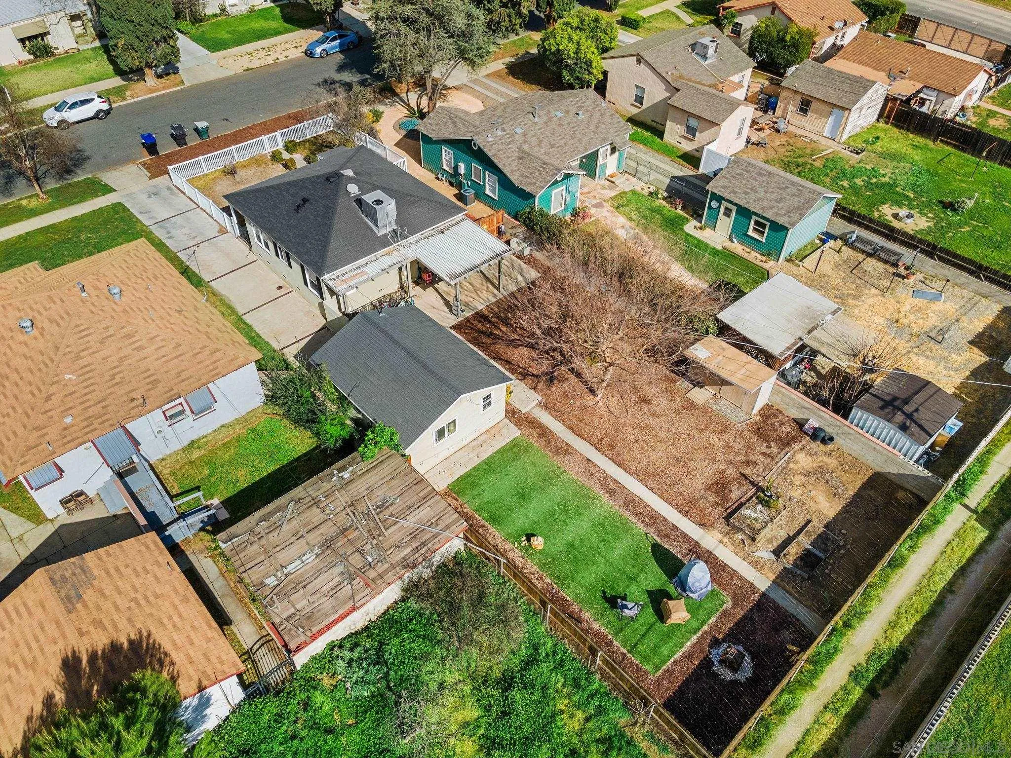 4544 Edgewood Place Riverside, CA 92506 - Photo 24 of 29 an aerial view of a residential apartment building with a yard