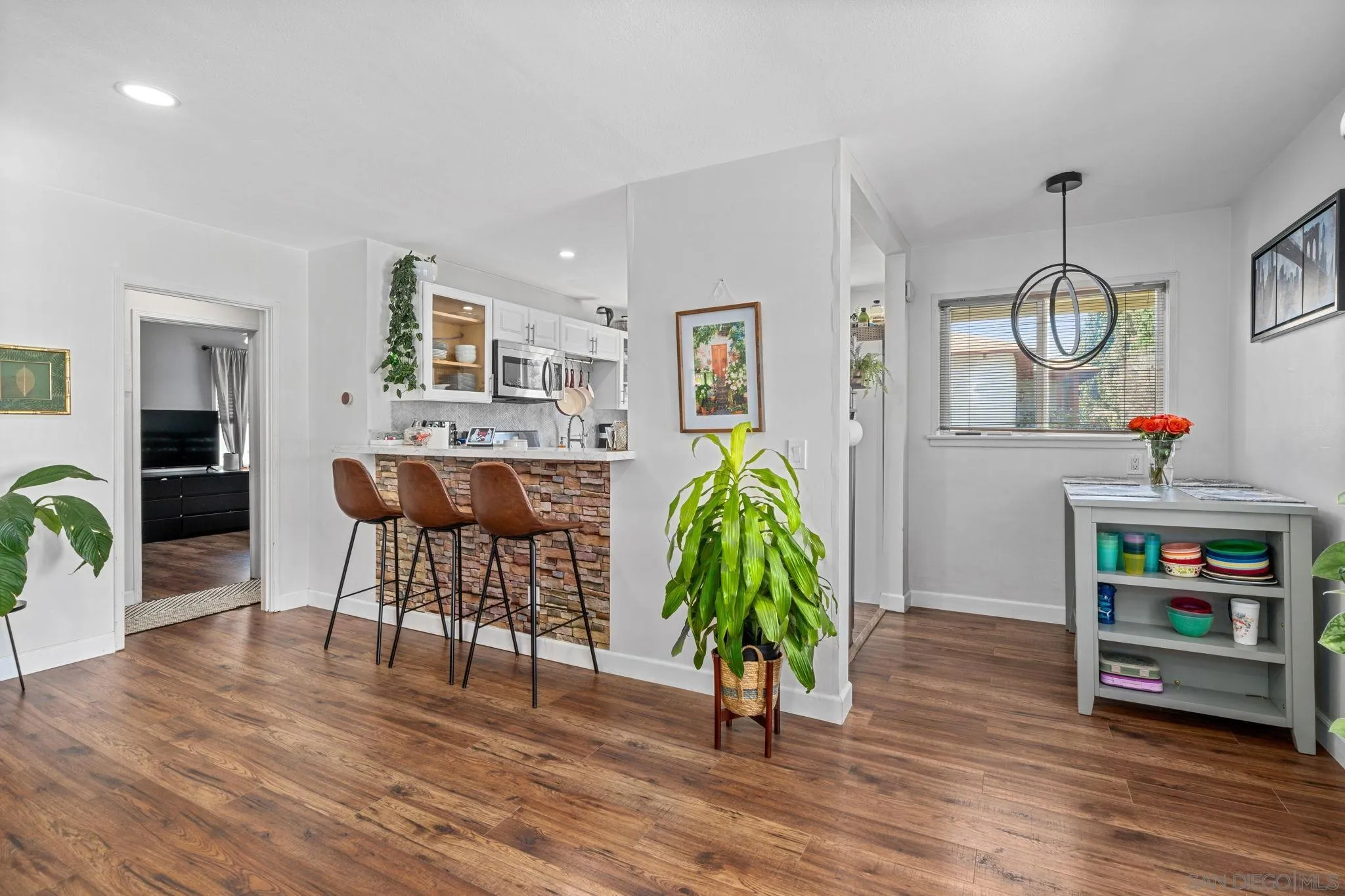 4544 Edgewood Place Riverside, CA 92506 - Photo 5 of 29 a living room with furniture and a wooden floor