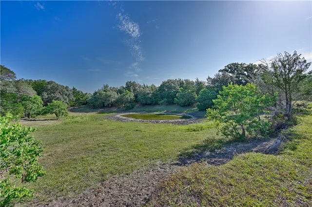 a view of a lake with beach
