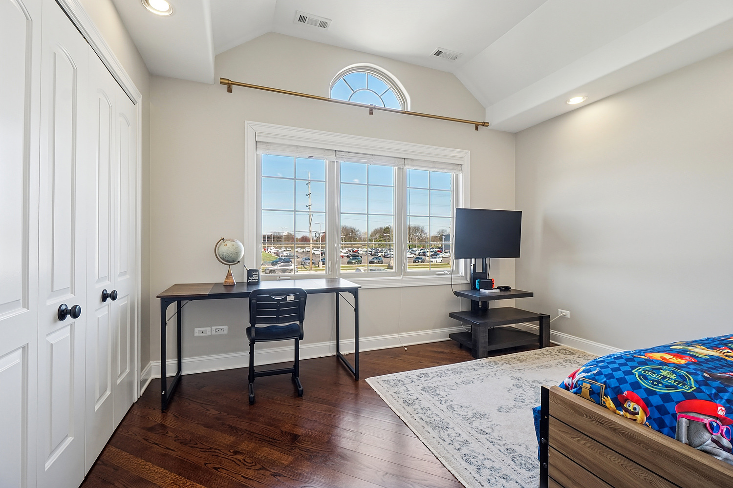 7039 Simpson Street Morton Grove, IL 60053 - Photo 23 of 24 a bed room with a bed window and a table