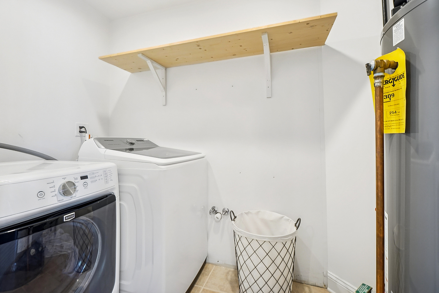 7039 Simpson Street Morton Grove, IL 60053 - Photo 24 of 24 a utility room with dryer and washer