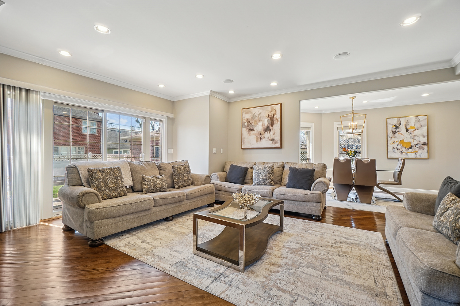 7039 Simpson Street Morton Grove, IL 60053 - Photo 9 of 24 a living room with furniture and wooden floor