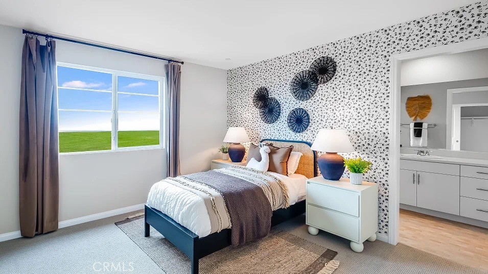 1658 Phantom Lane Rialto, CA 92376 - Photo 9 of 22 a bedroom with a bed and a window