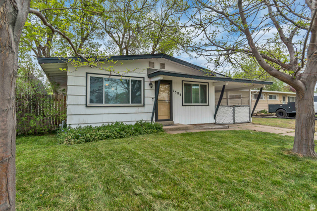 1384 North 475 West Sunset, UT 84015 - Photo 1 of 1 View of front of property featuring a porch