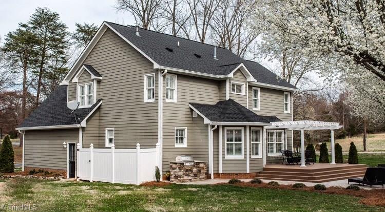 4901 Hackamore Road Greensboro, NC 27410 - Photo 19 of 21 Rear exterior encourages outdoor enjoyment!