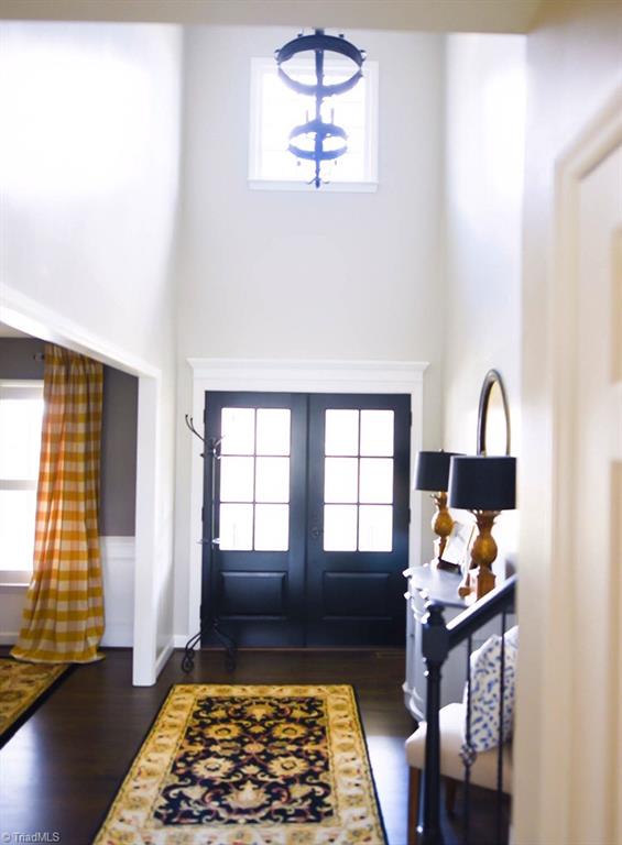 4901 Hackamore Road Greensboro, NC 27410 - Photo 21 of 21 Soft filtered natural light streams into this open concept floor plan.