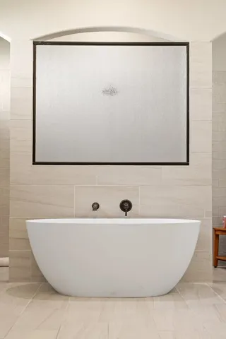 a view of a bathtub in a bathroom