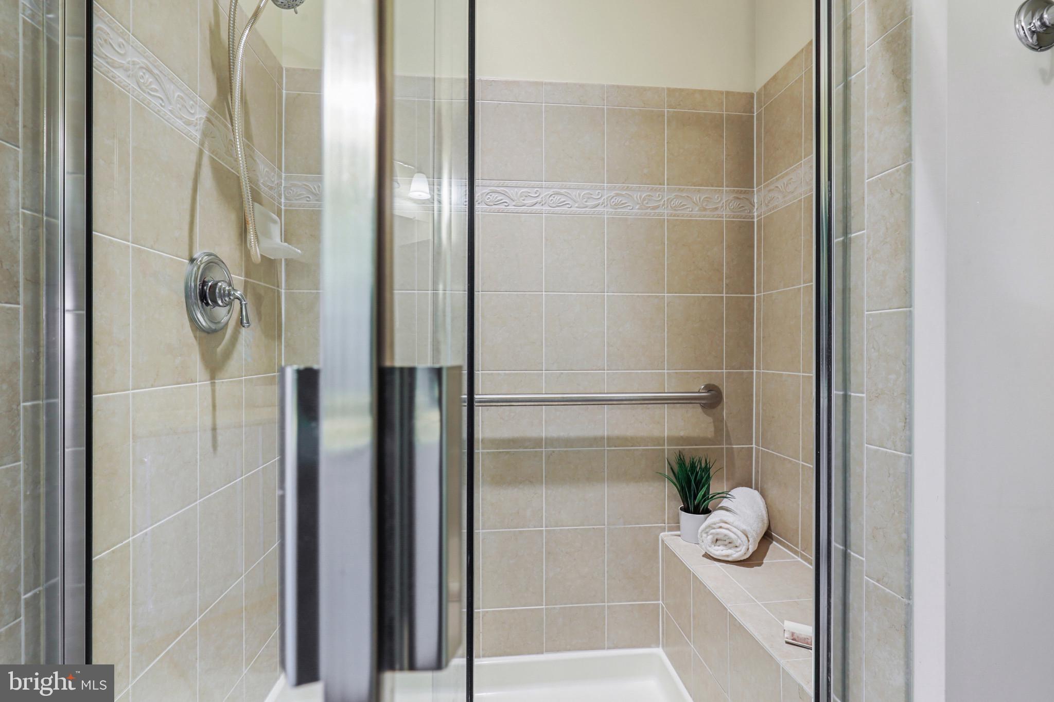 7315 Brookview Road, Unit 106 Elkridge, MD 21075 - Photo 34 of 47 Walk in primary bath shower w.seat