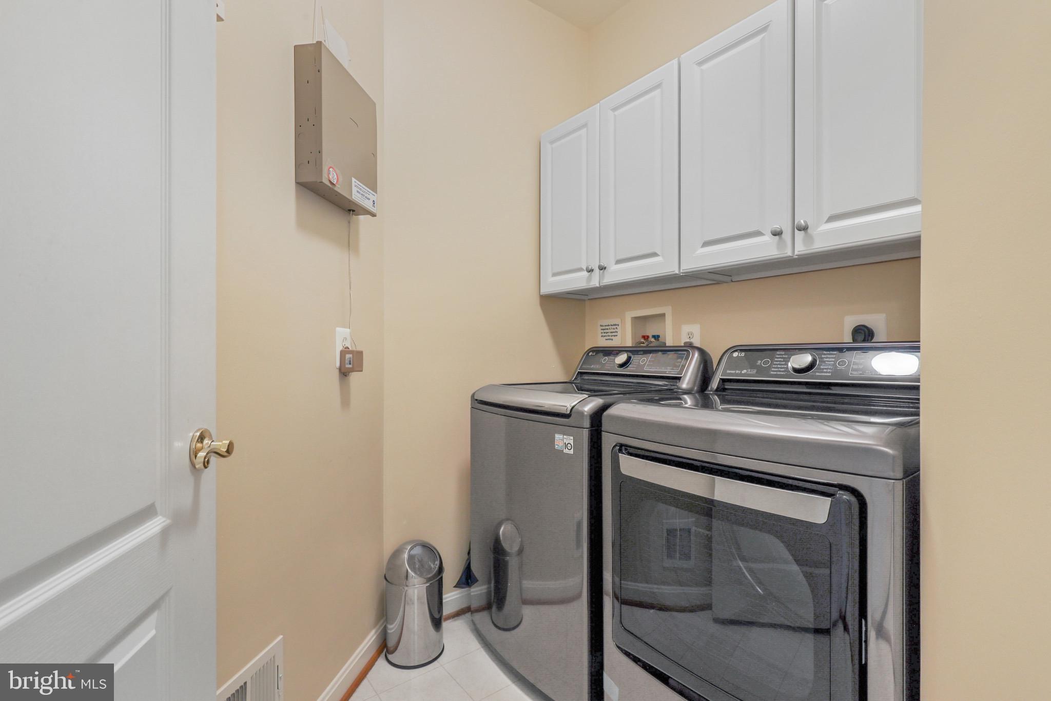 7315 Brookview Road, Unit 106 Elkridge, MD 21075 - Photo 40 of 47 Laundry area by front door