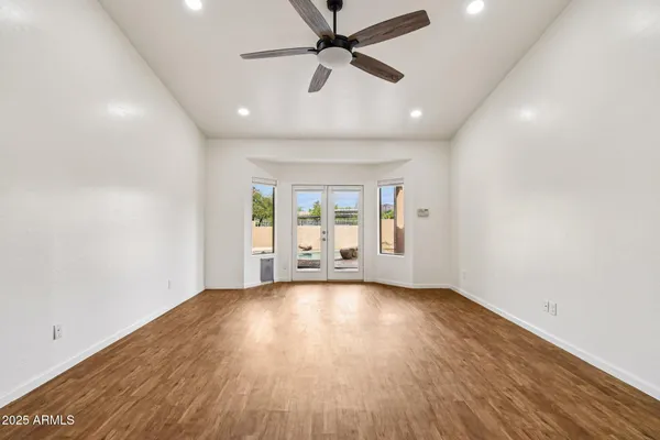 a view of kitchen and wooden floor