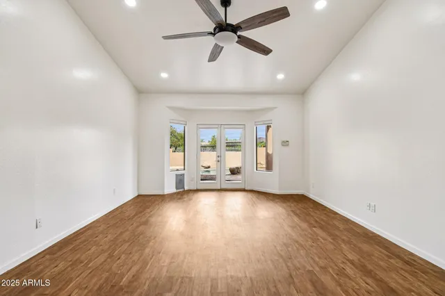 a view of kitchen and wooden floor