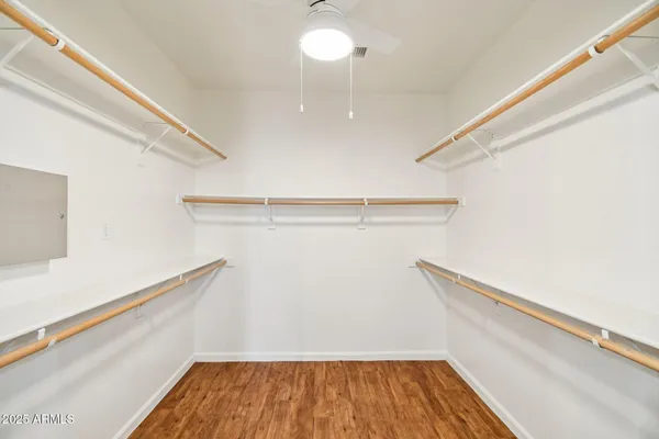 a view of a swimming pool with a lounge chairs