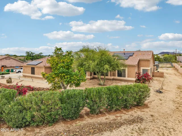 an aerial view of residential building with parking space