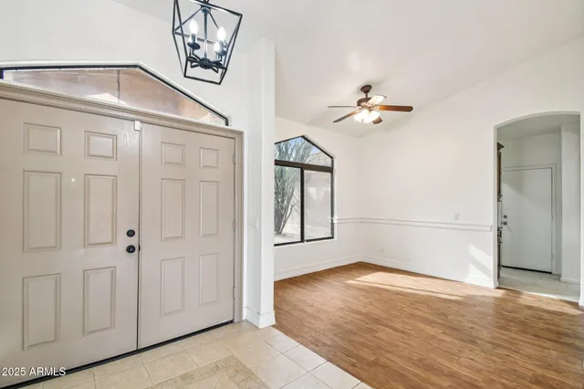 a view of a house with backyard