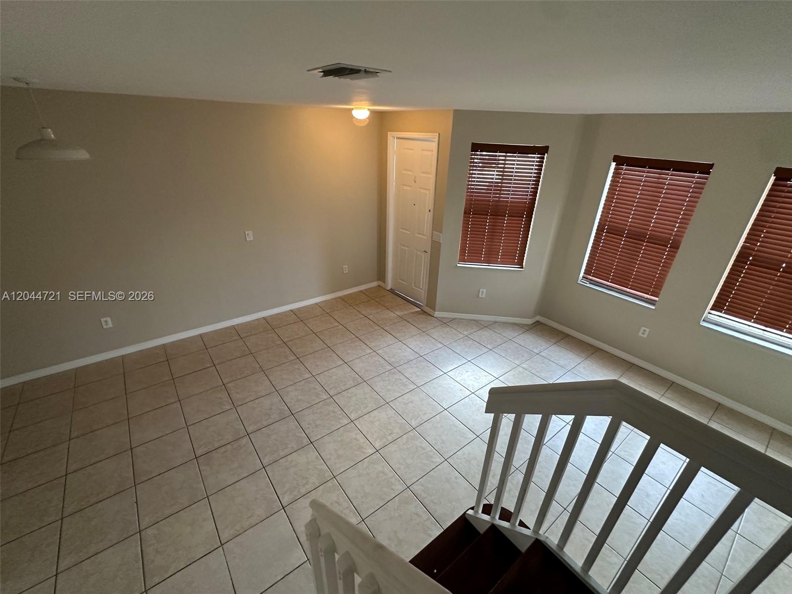 13741 Southwest 274th Terrace Homestead, FL 33032 - Photo 35 of 35 View of the main living area from the staircase