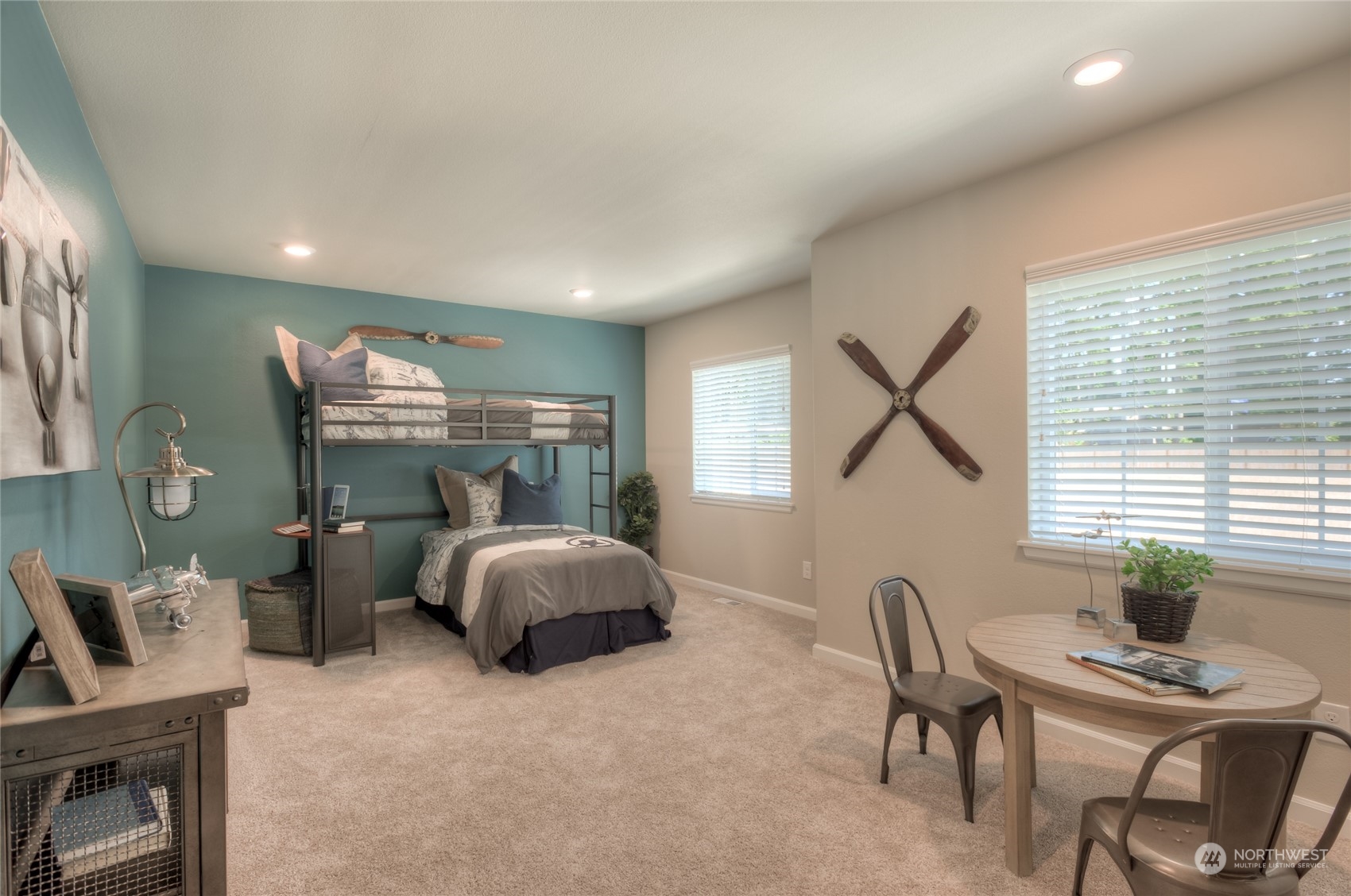 21104 42nd Avenue Southeast, Unit 146 Bothell, WA 98021 - Photo 5 of 25 a bedroom with furniture and a window