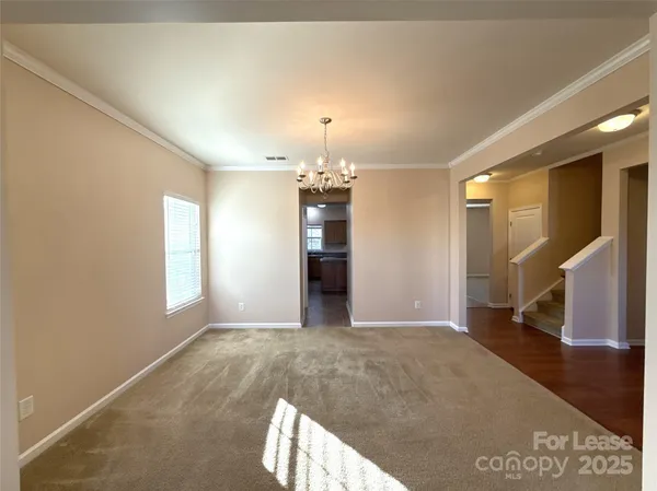 a view of a room with a fireplace