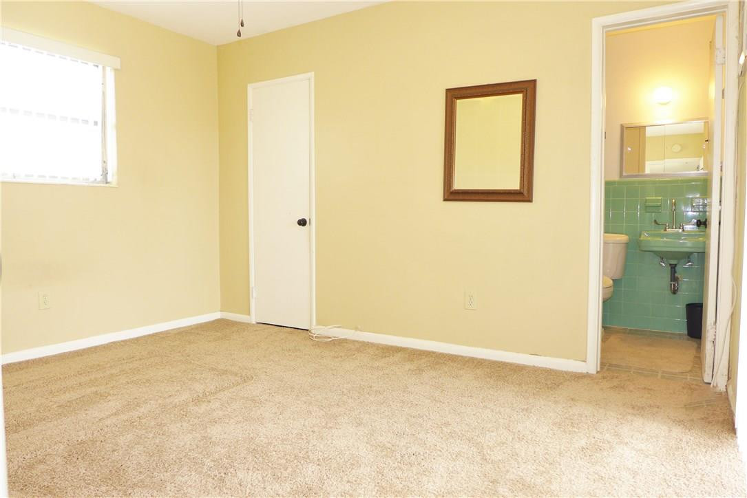 7860 Raleigh Street Hollywood, FL 33024 - Photo 5 of 29 Master Bedroom has newer clean carpet.