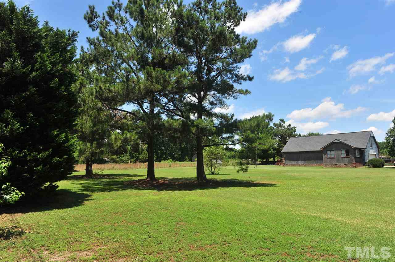 6909 Riley Hill Road Wendell, NC 27591 - Photo 1 of 12 View from Riley Hill Rd. Construction is not complete and will not be completed by seller. Home is sold as is. Roof replaced in 2011. Interior is a shell for buyer to design walls where they want. The Well is dug and ready for new owner to run plumbing.