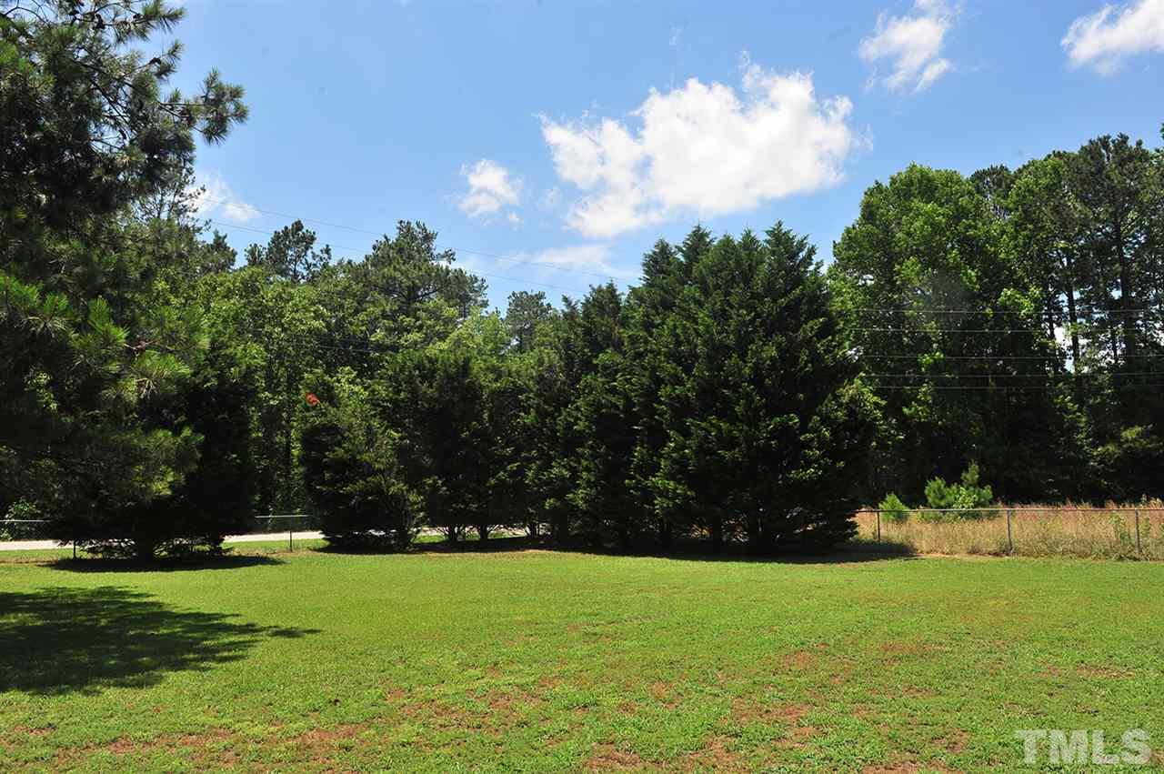 6909 Riley Hill Road Wendell, NC 27591 - Photo 11 of 12 0.95 Acres (so barely under 1 Acre!). Nice lawn and trees. Level lot. Partially fenced.