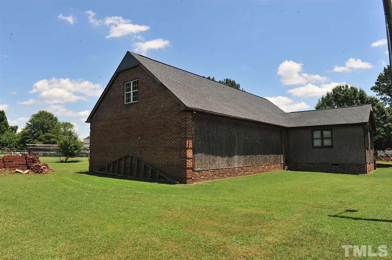 6909 Riley Hill Road Wendell, NC 27591 - Photo 3 of 12 Brick on 2 sides. Stack of brick material is also included.