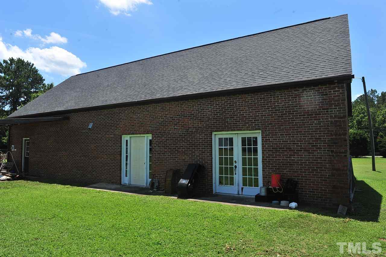 6909 Riley Hill Road Wendell, NC 27591 - Photo 4 of 12 Brick on 2 sides. Stack of brick material is also included.