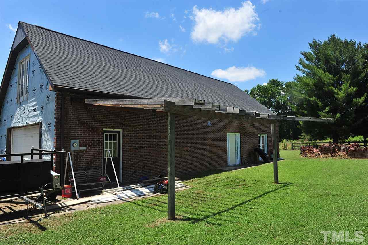 6909 Riley Hill Road Wendell, NC 27591 - Photo 5 of 12 Brick on 2 sides. Stack of brick material is also included.