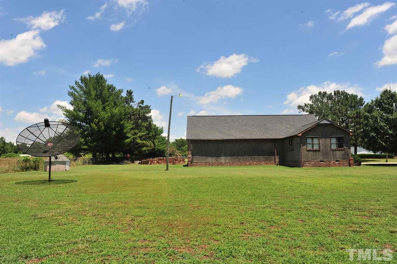 6909 Riley Hill Road Wendell, NC 27591 - Photo 8 of 12 Brick on 2 sides. Incomplete siding with OSB board on remaining.