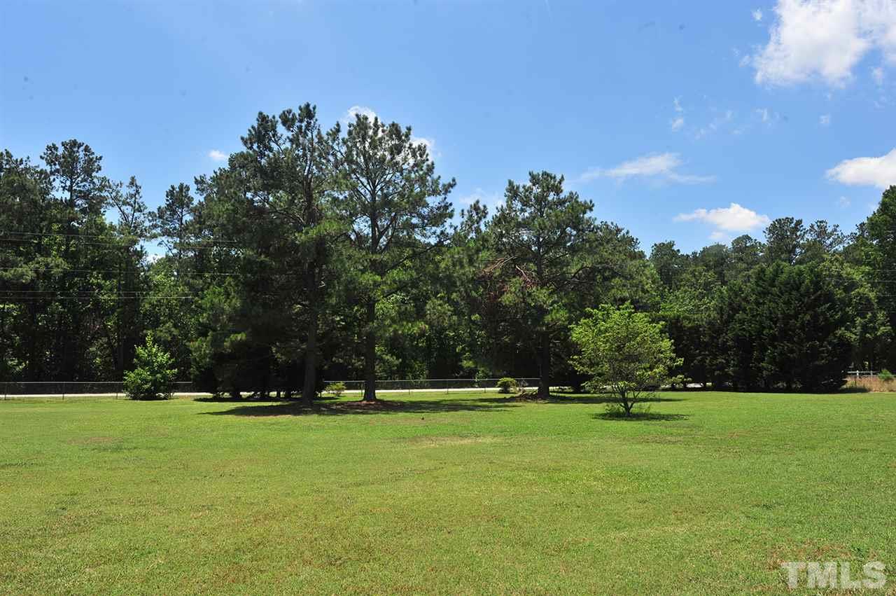6909 Riley Hill Road Wendell, NC 27591 - Photo 9 of 12 0.95 Acres (so barely under 1 Acre!). Nice lawn and trees. Level lot. Partially fenced.
