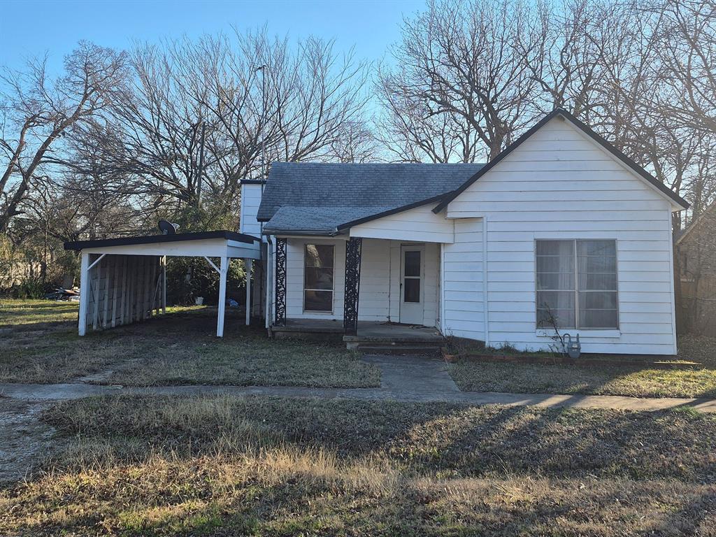 307 West Spruce Street Whitewright, TX 75491 - Photo 1 of 12 a view of a house with a yard