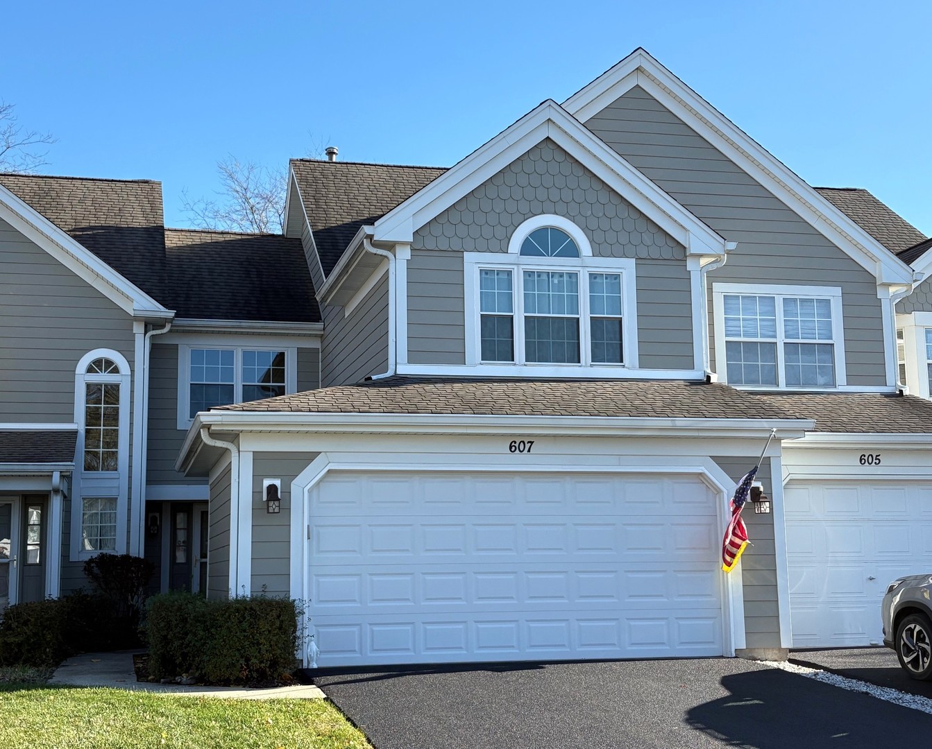 a front view of a house with a yard