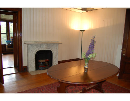 99 Sedgwick Street Boston, MA 02130 - Photo 4 of 14 a view of a livingroom with furniture and kitchen floor