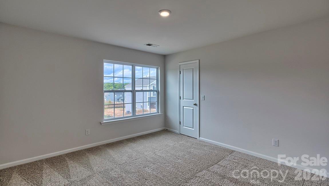 42 Salers Road Fletcher, NC 28732 - Photo 14 of 26 a view of an empty room with a window