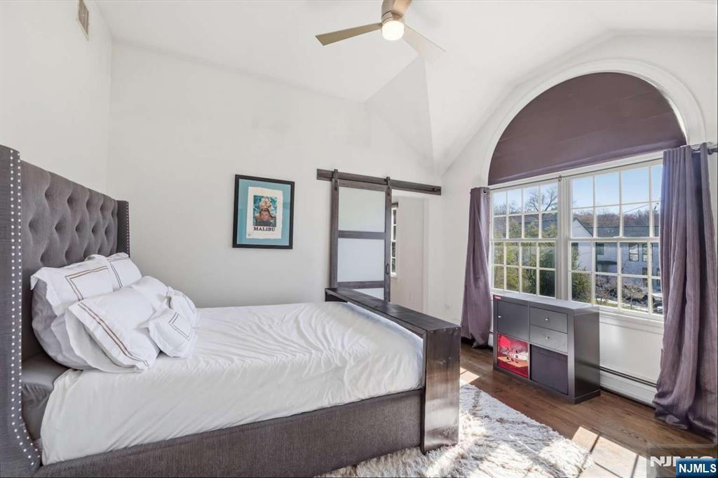 8 Wainwright Court Closter, NJ 07624 - Photo 18 of 29 a bedroom with a bed and a window