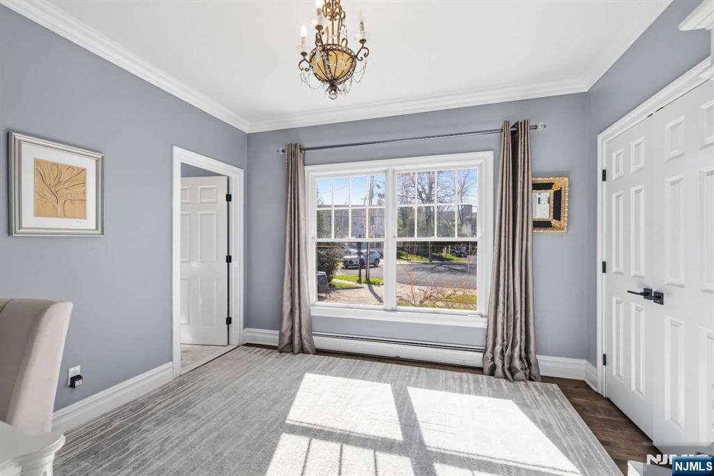8 Wainwright Court Closter, NJ 07624 - Photo 22 of 29 a view of a hallway with a window and outdoor space
